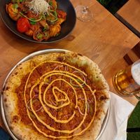 Chorizo pizza & spicy Momos at Plant Base in Lisbon