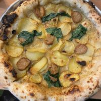 Pizza Patata & salsicha  at Plant Base in Lisbon