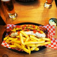 Delicious hot dog and fries! at Plant Base in Lisbon