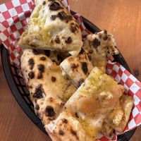 garlic bread with vegan cheese  at Plant Base in Lisbon