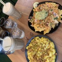 Mac and cheese, nachos, iced caramel latte   at Plant Base in Lisbon
