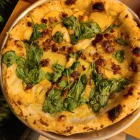 Potato and meat pizza at Plant Base in Lisbon