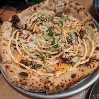 Big Mac pizza at Plant Base in Lisbon