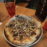 The Fungees Pizza was so delicious 💚 at Plant Base in Lisbon