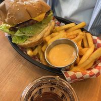 Burger served with fries   at Plant Base in Lisbon