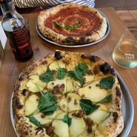 Vegan sausage and potato pizza with cheese base and a marinara  at Plant Base in Lisbon