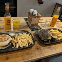 Prego sandwich and a burger at Plant Base in Lisbon
