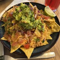 Nachos (was a bit too liquid at the bottom, the chips got super wet)  at Plant Base in Lisbon