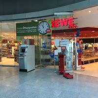Front entrance, near regional train station inside airport at FRA - REWE City - T1 in Frankfurt