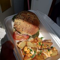 crazy burger + bravas to take away  at Cat Bar in Barcelona