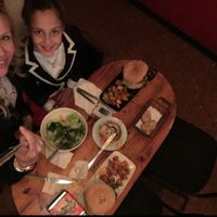 Ensalada, humus, 2 hamburgers y patata total 27€ at Cat Bar in Barcelona