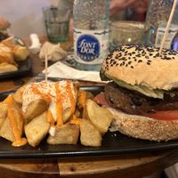 Black cat burger with bravas    at Cat Bar in Barcelona