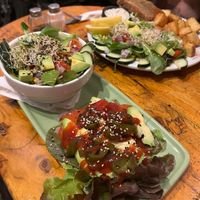 Grilled cactus with salad in the front, tofish with chips and salad in the back. A lot of fresh and tasty stuff! at Cat Bar in Barcelona