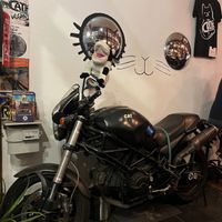 Motorcycle as a design element. A lot of punk elements around! at Cat Bar in Barcelona