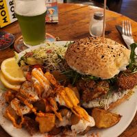 The Tofish sandvitx with pastas bravas and salad is amazing! Big portion super affordable and delicious. Finally eating something different from the regular veggie burger! 💜 at Cat Bar in Barcelona