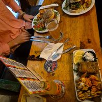 One fish and chips and two cat burgers at Cat Bar in Barcelona