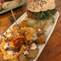 Tof-Fish in a bun with patatas bravas   at Cat Bar in Barcelona