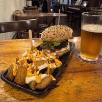 the black bean burger and patatas bravas  at Cat Bar in Barcelona
