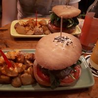 Green burger with patatas at Cat Bar in Barcelona