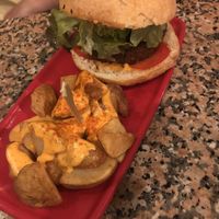 Burger with chips at Cat Bar in Barcelona