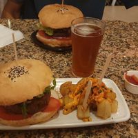 Mushroom burger with "papas bravas" at Cat Bar in Barcelona