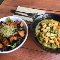 Harvest bowl and vegetable curry with tempeh .  at Lotus Cafe in Panama City Beach