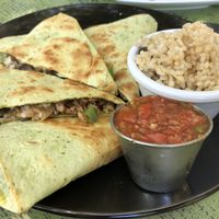 Vegan tempeh quesadilla with rice and beans as side at Lotus Cafe in Panama City Beach