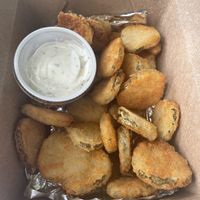 Half order of fried pickles   at Nom Burgers in Austin