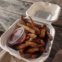 Sweet potato fries (2 ⭐️ )  at Nom Burgers in Austin