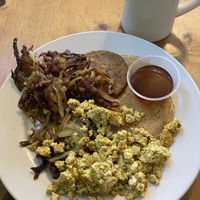 Veganized Grand Slam. One fluffy pancake, hash browns, tofu “eggs”, vegan sausage. at Seward Cafe in Minneapolis
