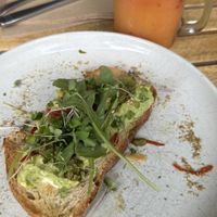 Smashed avocado, mango berry juice.  at Roam in Port Macquarie