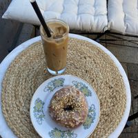 Iced latte and cardamom donut  at Round & Square in Helsinki