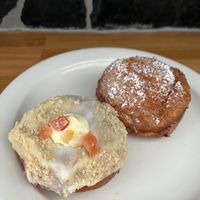 Spring fruit cookie donut and chocolate raspberry donut. They had several other amazing-looking flavors too! Really good raises donuts with nice flavors.   at Round & Square in Helsinki