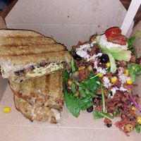 Cheese jerk chic*en tomoto tostie with rice salad 🥗 at Cosy Jazz Cafe in Blackpool