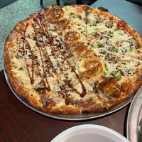 half bbq chikn half deluxe border pizza at Mario's Pizza in Orlando