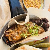 Vegan and delicious ‘blood sausage’ with mustard  at Szklarnia Warszawa in Warsaw