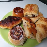Clockwise from top: chocolate croissant, croissant, raisin bread, hazelnut roll, ginger pearl sugar bread, cinnamon roll...all amazing at De Broodenier in Leuven