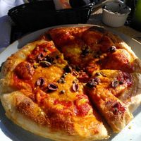 Pizza marinara with extra vegan cheese at Oppi'z in Santa Barbara