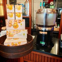 Hot chocolate and boxes at Vegan Nata - Chiado in Lisbon