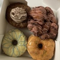 Coffee, raspberry fritter, lavender-lemon and mango-cayenne pepper  at La Beignerie in Montreal