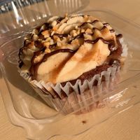 Snickers Cupcake 🖤 at Molly's Corner Cafe & Bakery in Reading