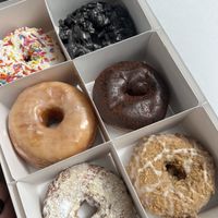 Birthday cake, oreo, vanilla, boston cream, orange poppy, coffee cake  at Beacon Doughnuts in Chicago