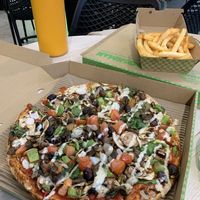 Vegan pizza and hot chips  at OOSHMAN in Randwick