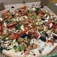 Pizza with added Chick’n  at OOSHMAN in Randwick