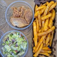 Fatoosh salad $6.95: great crispy fried zaatar chips but the salad was swimming in dressing and not fresh or crunchy; Lebo chips $9.95: marinated in touch of spice and garlic at OOSHMAN in Randwick