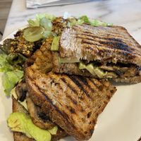 Avocado & mushroom toast at Bloomy Market in Setubal