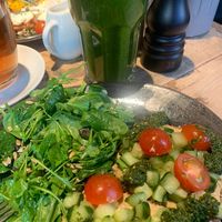 green smoothie and vegan pesto and hummus open sandwich  at Cotidiano Promenadenplatz in Munich