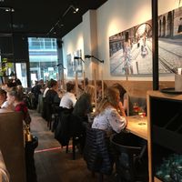 Restaurant interior (corona style) at Cotidiano Promenadenplatz in Munich