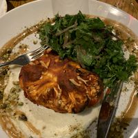 Cauliflower brushed with roasted red pepper over toum and a parsley salad  at TIQA in Portland