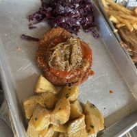 Schnitzel with potato salad and red cabbage side  at Gemüt Biergarten in Columbus